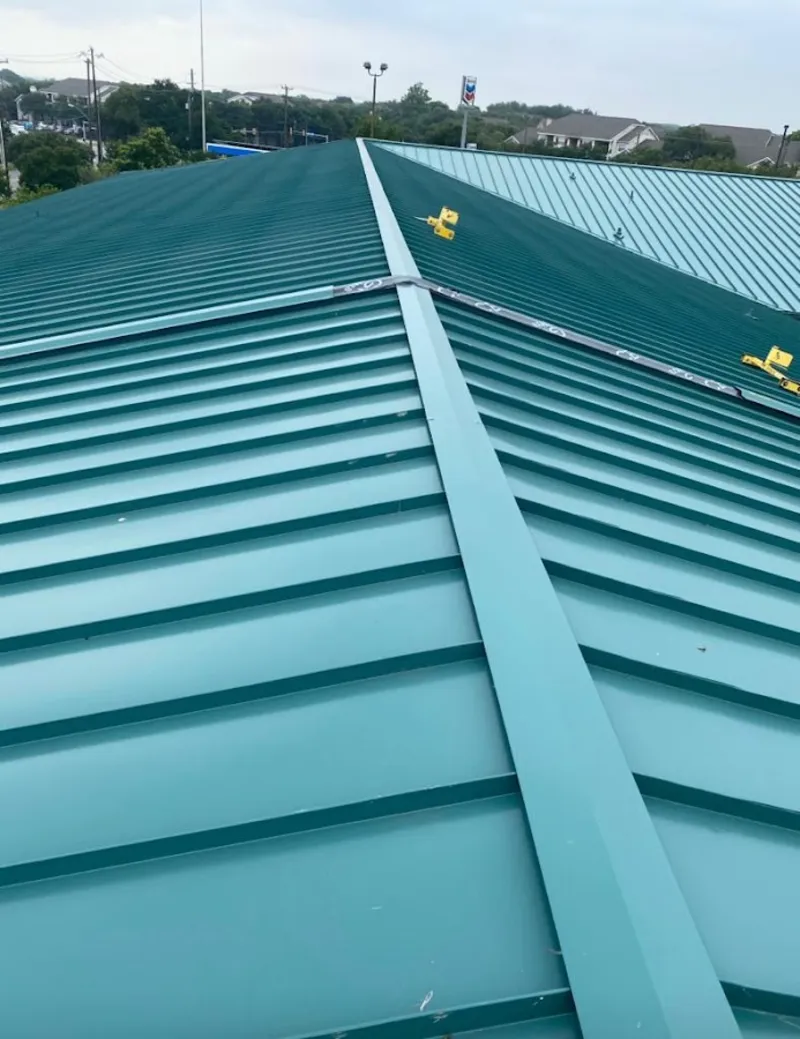 Green commercial metal roof ridge and valley for Metal Roof Repair in Slinger